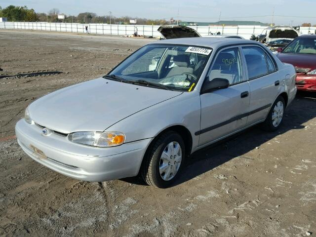 1Y1SK5284YZ435707 - 2000 CHEVROLET GEO PRIZM SILVER photo 10