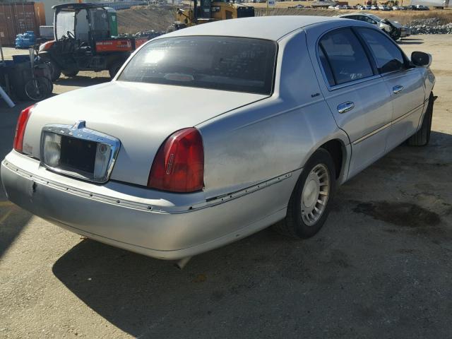 1LNHM81W7YY933265 - 2000 LINCOLN TOWN CAR E SILVER photo 4