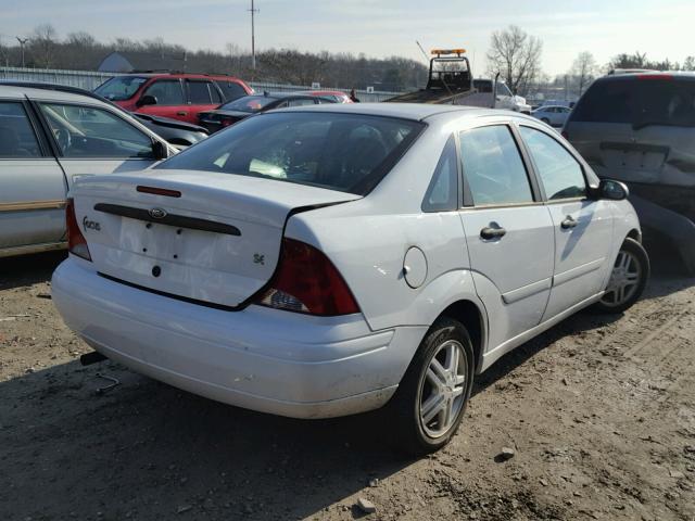 1FAFP34P23W269073 - 2003 FORD FOCUS SE WHITE photo 4