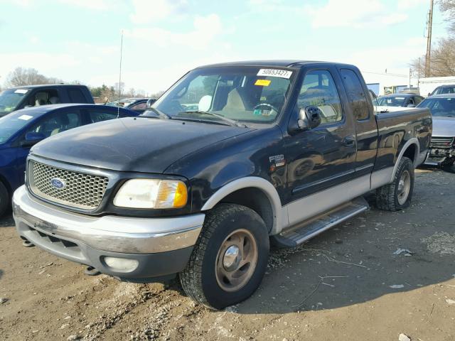 1FTRX18L11NA15697 - 2001 FORD F150 BLACK photo 2