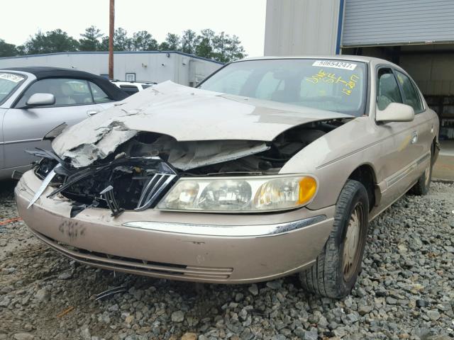 1LNFM97V0WY613679 - 1998 LINCOLN CONTINENTA GOLD photo 2