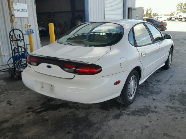 1FAFP53S1XA316033 - 1999 FORD TAURUS SE WHITE photo 4