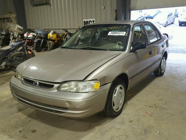 2T1BR12EXYC275048 - 2000 TOYOTA COROLLA VE GOLD photo 2