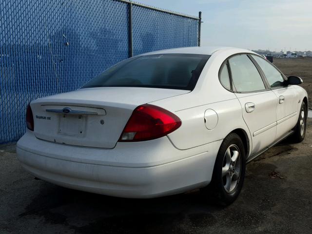 1FAFP552XYA202613 - 2000 FORD TAURUS SES WHITE photo 4