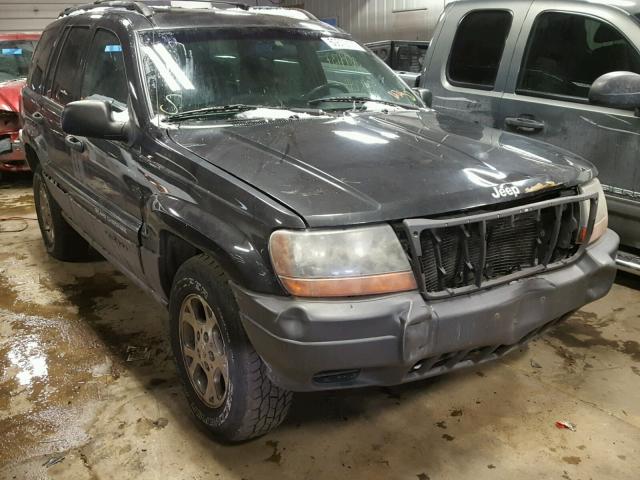 1J4GW58S0XC788863 - 1999 JEEP GRAND CHER GRAY photo 1