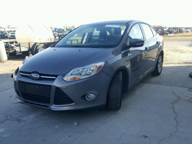 1FAHP3H27CL196131 - 2012 FORD FOCUS SEL GRAY photo 2