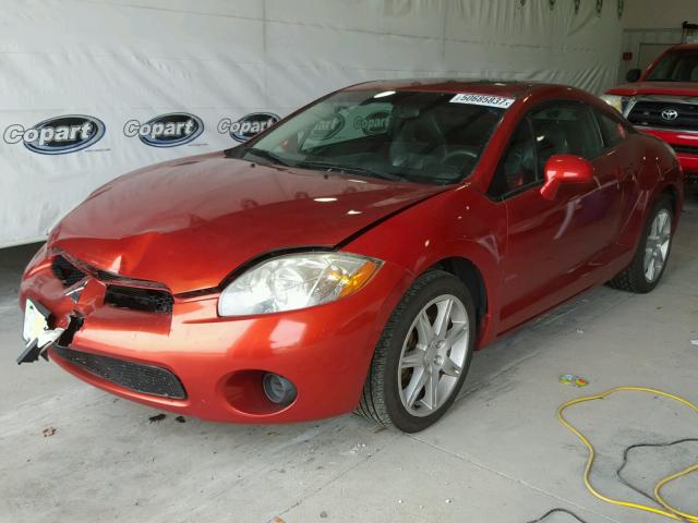 4A3AK64F27E053227 - 2007 MITSUBISHI ECLIPSE ES ORANGE photo 2