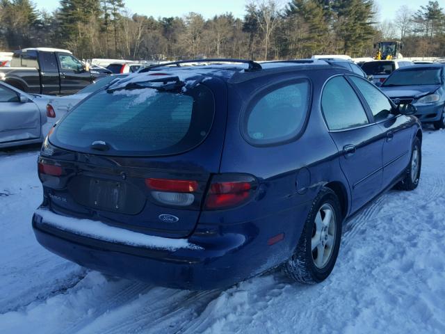 1FAFP58S8YG282180 - 2000 FORD TAURUS SE BLUE photo 4