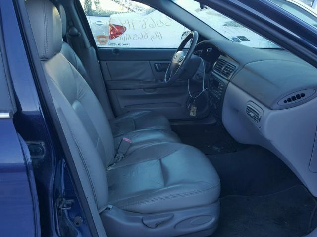 1FAFP58S8YG282180 - 2000 FORD TAURUS SE BLUE photo 5