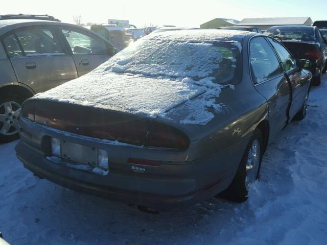 1G3GR62C6X4116868 - 1999 OLDSMOBILE AURORA TAN photo 4