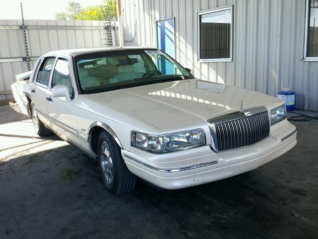 1LNLM83W5VY633162 - 1997 LINCOLN TOWN CAR C BEIGE photo 1