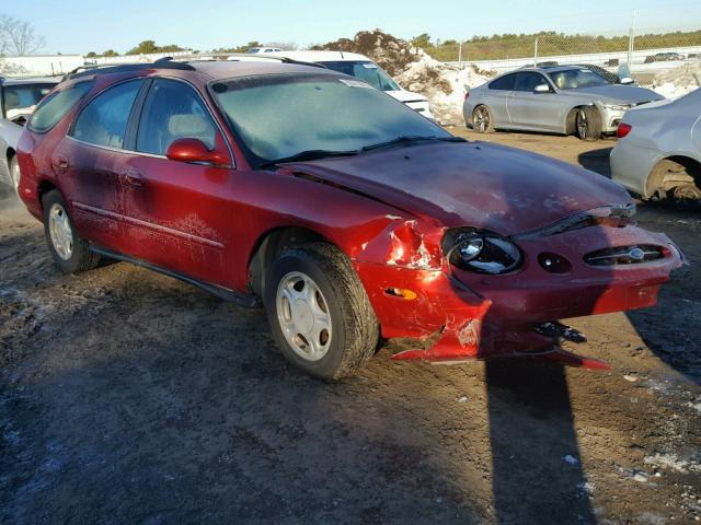 1FAFP58U3XA209768 - 1999 FORD TAURUS SE RED photo 1