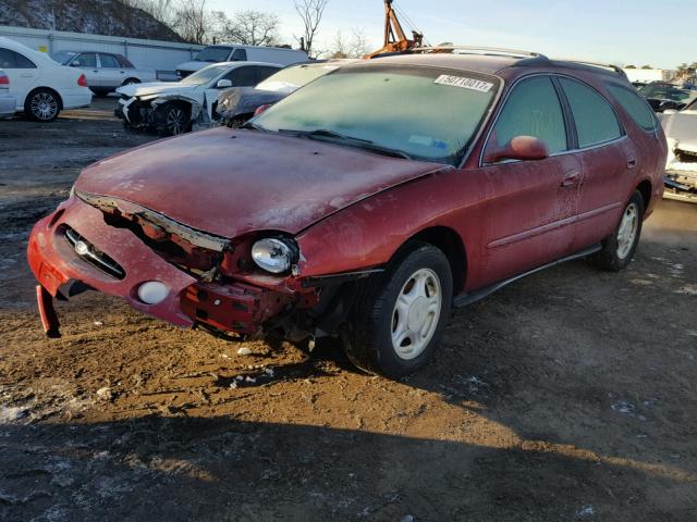 1FAFP58U3XA209768 - 1999 FORD TAURUS SE RED photo 2