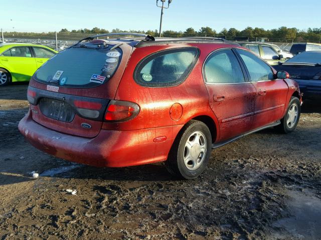 1FAFP58U3XA209768 - 1999 FORD TAURUS SE RED photo 4