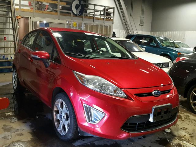 3FADP4FJ7BM113566 - 2011 FORD FIESTA SES RED photo 1