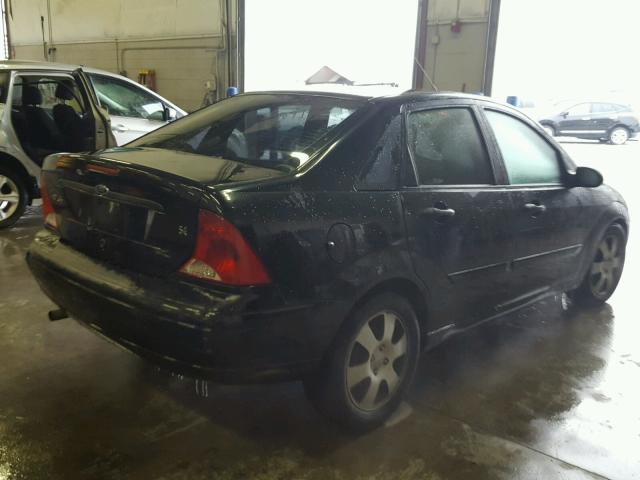 1FAFP34342W354346 - 2002 FORD FOCUS SE BLACK photo 4