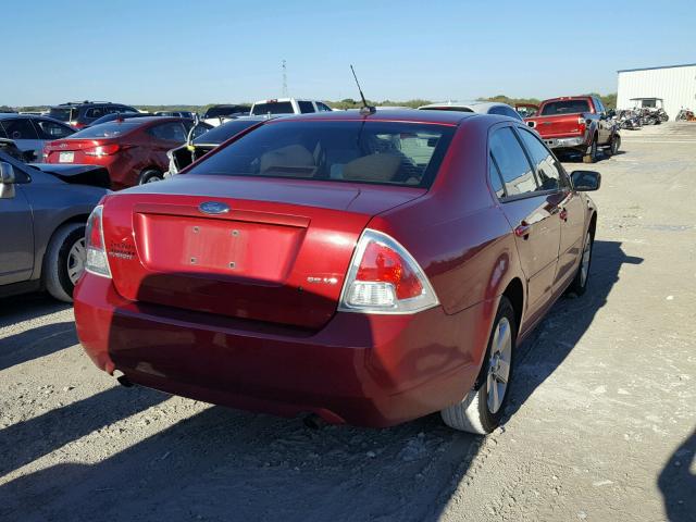 3FAHP071X9R193094 - 2009 FORD FUSION SE RED photo 4