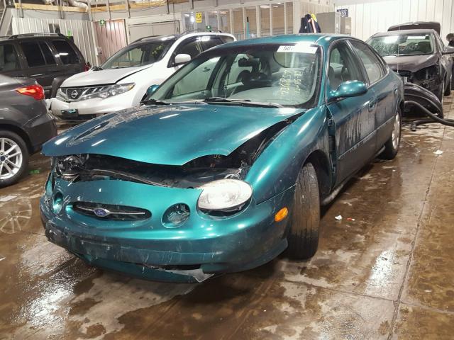 1FAFP52U1WG108569 - 1998 FORD TAURUS LX GREEN photo 2