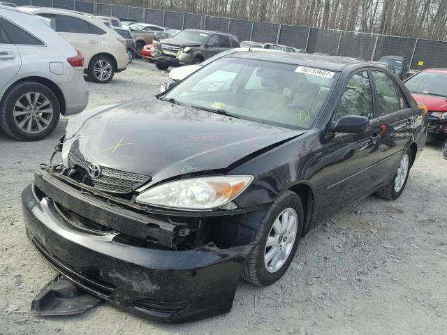 4T1BE30KX2U037593 - 2002 TOYOTA CAMRY LE BLACK photo 2