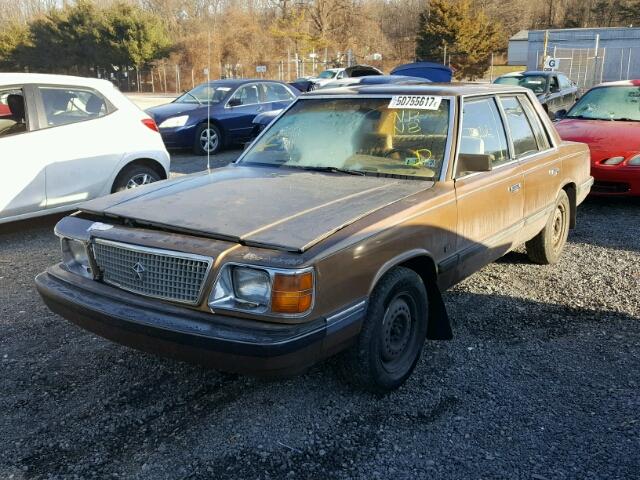 1P3BP36KXHF125594 - 1987 PLYMOUTH RELIANT LE BROWN photo 2