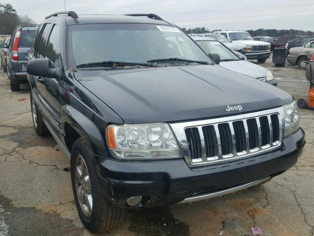 1J8GX68J54C344415 - 2004 JEEP GRAND CHER BLACK photo 1