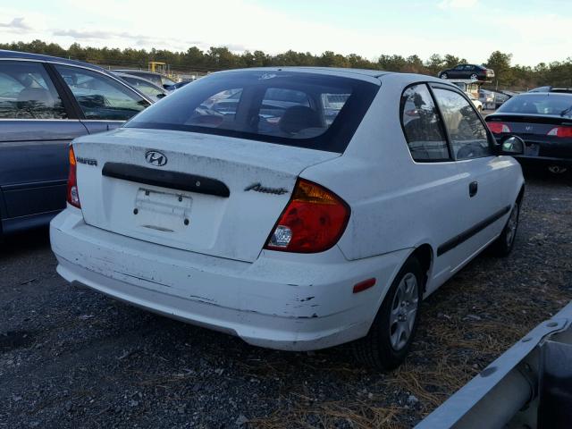 KMHCF35C53U260984 - 2003 HYUNDAI ACCENT L WHITE photo 4