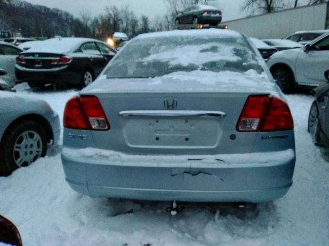 1HGEM22572L020697 - 2002 HONDA CIVIC LX BLUE photo 9