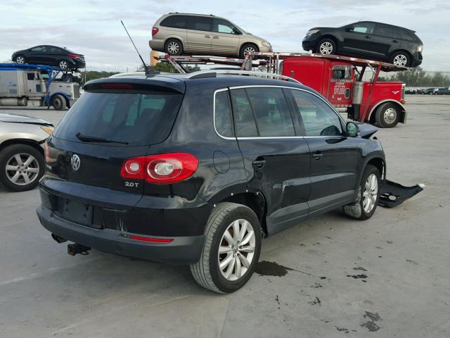 WVGAV7AX2BW536664 - 2011 VOLKSWAGEN TIGUAN S BLACK photo 4