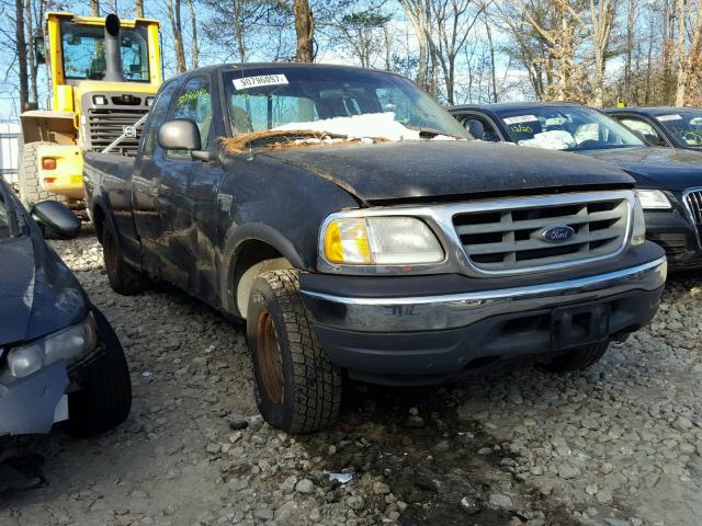 1FTRX18W0YNB90754 - 2000 FORD F150 BLACK photo 1