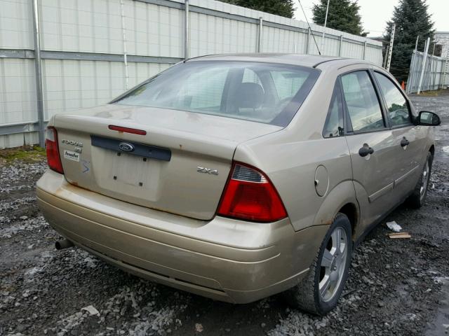 1FAFP34N86W135185 - 2006 FORD FOCUS ZX4 GOLD photo 4