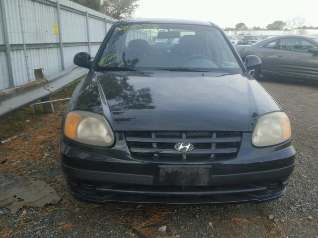 KMHCG45CX3U426015 - 2003 HYUNDAI ACCENT BLACK photo 7