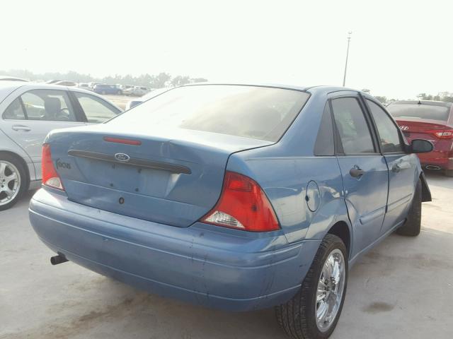 1FAFP34P9YW153179 - 2000 FORD FOCUS SE BLUE photo 4