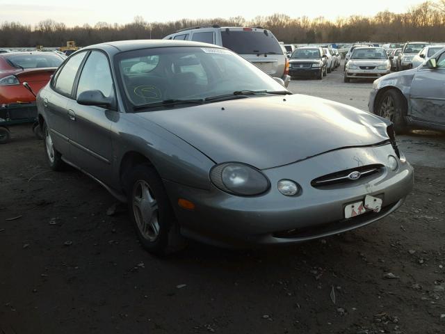 1FAFP53S8XG316530 - 1999 FORD TAURUS SE GRAY photo 1