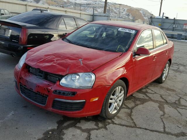 3VWRL71KX9M160885 - 2009 VOLKSWAGEN JETTA TDI RED photo 2