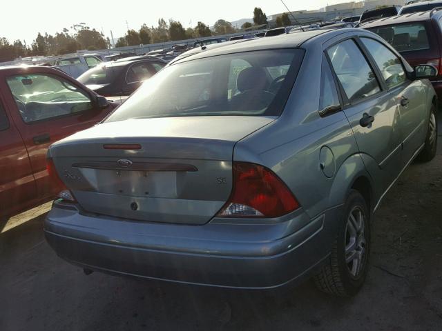 1FAFP34ZX3W232287 - 2003 FORD FOCUS SE C GREEN photo 4