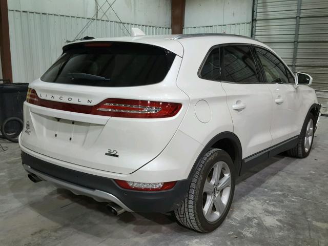 5LMCJ1C97GUJ07925 - 2016 LINCOLN MKC PREMIE WHITE photo 4