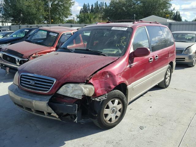 KNDUP131936475252 - 2003 KIA SEDONA EX RED photo 2