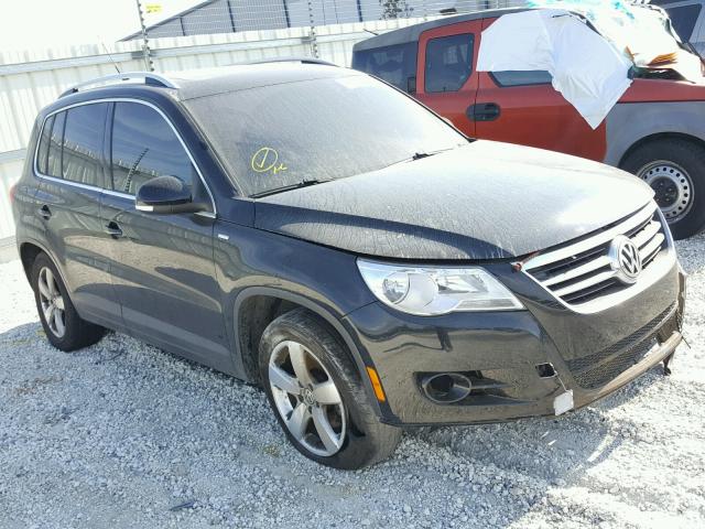 WVGAV7AX0AW520316 - 2010 VOLKSWAGEN TIGUAN S BLACK photo 1