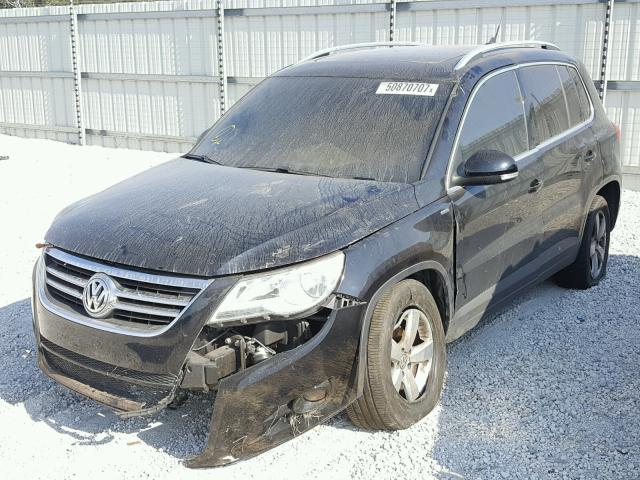 WVGAV7AX0AW520316 - 2010 VOLKSWAGEN TIGUAN S BLACK photo 2