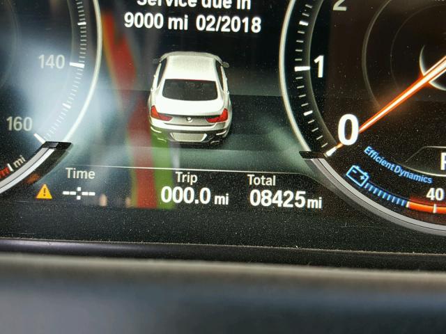 WBA6B2C50FGB99767 - 2015 BMW 650 I შავი ფოტო 8