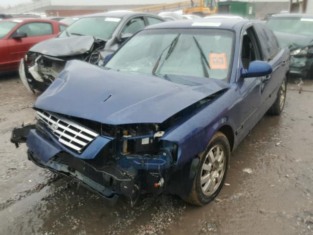 KNAGD128225170309 - 2002 KIA OPTIMA MAG BLUE photo 2