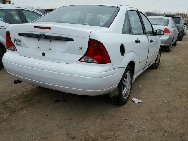 1FAFP34P03W313748 - 2003 FORD FOCUS SE WHITE photo 4