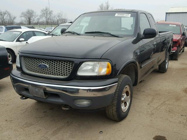 2FTRX18W01CA70173 - 2001 FORD F150 BLACK photo 2