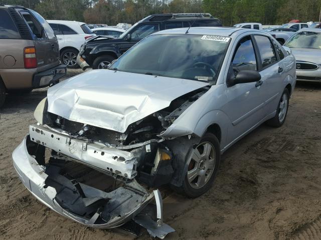 1FAHP34N46W214409 - 2006 FORD FOCUS ZX4 SILVER photo 2