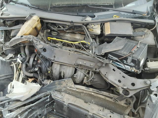 1FAFP34N95W140975 - 2005 FORD FOCUS ZX4 BLACK photo 7