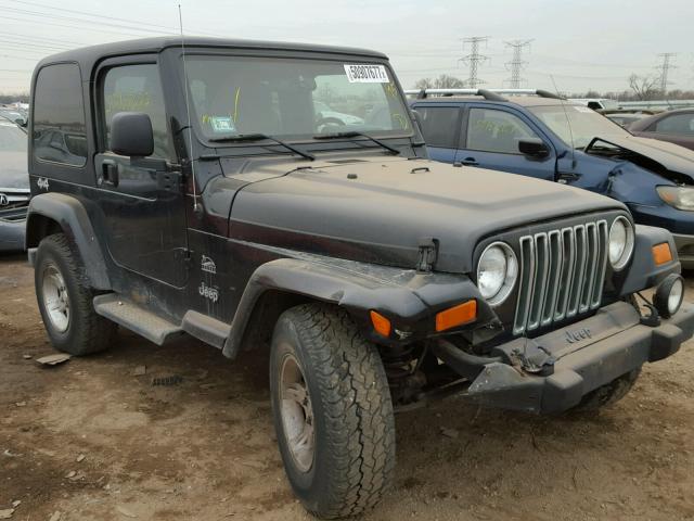 1J4FA59S24P746823 - 2004 JEEP WRANGLER / BLACK photo 1