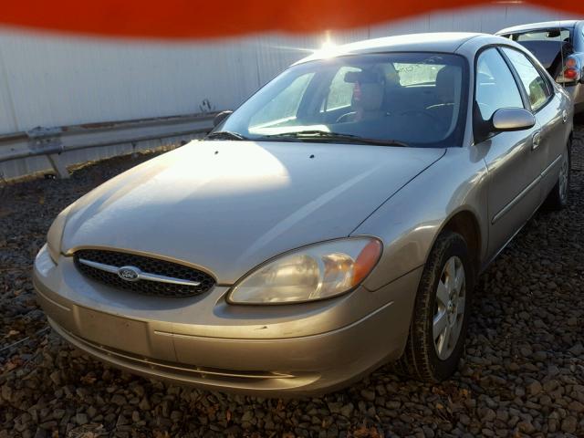 1FAFP52U0YG241570 - 2000 FORD TAURUS LX TAN photo 2