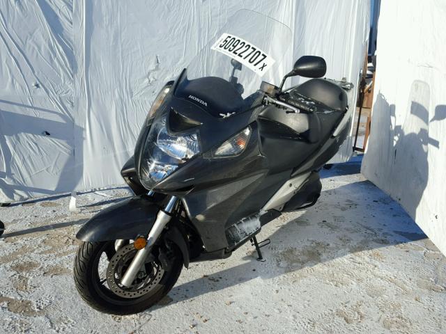 JH2PF01118K600182 - 2008 HONDA FSC600 D GRAY photo 2