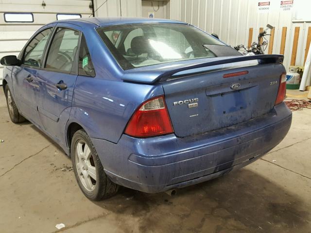 1FAFP34N35W312594 - 2005 FORD FOCUS ZX4 BLUE photo 3