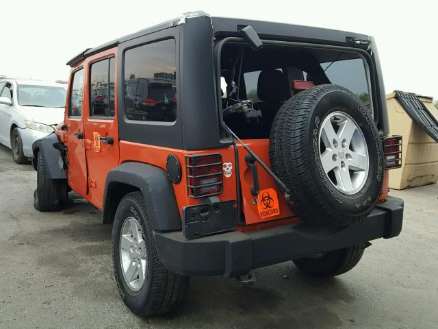 1C4BJWDGXFL599464 - 2015 JEEP WRANGLER U ORANGE photo 3